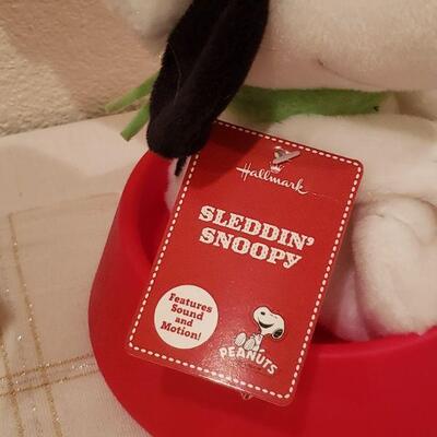 Lot 975:  NEW Dept. 56 Snoopy Deco and Animated Sledding Snoopy 