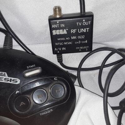 Sega Controller, Power Cord, And Tv Adapter