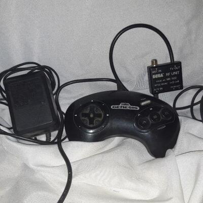 Sega Controller, Power Cord, And Tv Adapter
