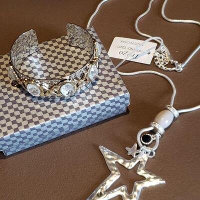 Lot 978: NEW Long Necklace with a Star Pendant & a Cuff Bracelet 