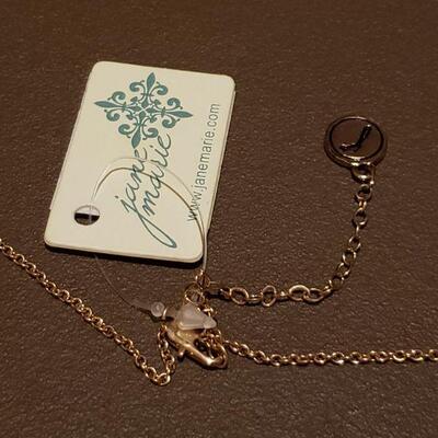 Lot 982: NEW Gold Painted Black Feather Pendant Necklace and Hematite Necklace