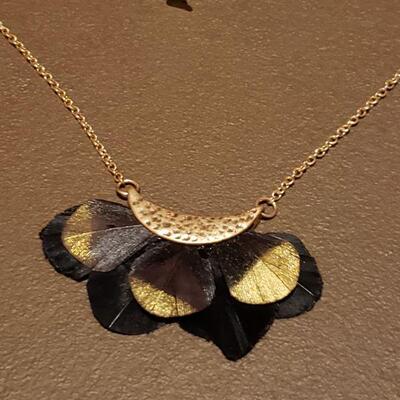 Lot 982: NEW Gold Painted Black Feather Pendant Necklace and Hematite Necklace