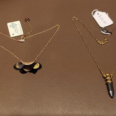 Lot 982: NEW Gold Painted Black Feather Pendant Necklace and Hematite Necklace