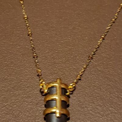 Lot 982: NEW Gold Painted Black Feather Pendant Necklace and Hematite Necklace