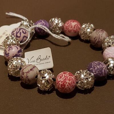 Lot 985: NEW Expandable Horse Bracelet and Handmade Clay Bead Bracelet 