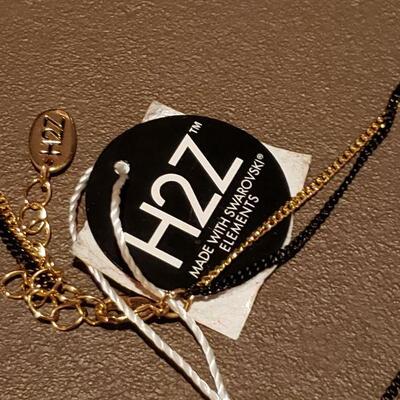 Lot 987: NEW H2 Swarovski Elements Necklace and Black Tassel Bracelet 