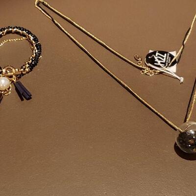 Lot 987: NEW H2 Swarovski Elements Necklace and Black Tassel Bracelet 