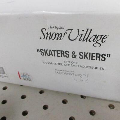 Lot 277 - Dept. 56 Snow Village Skaters & Skiers 