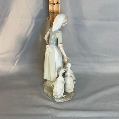 Lot 34 - Girl with Geese Figurine