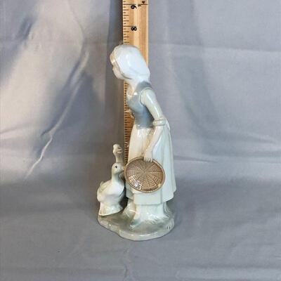 Lot 34 - Girl with Geese Figurine