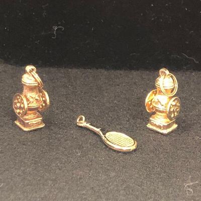 Lot 55 - Gold Tone Charms Avon