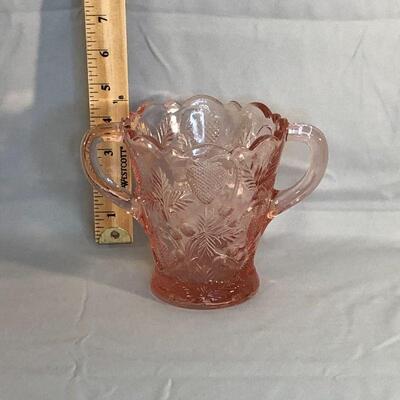 Lot 66 - Pink Glass Strawberry Handled Vase