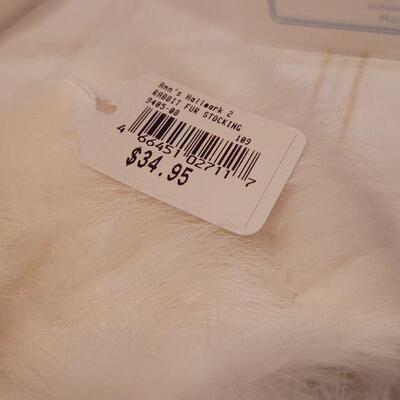 Lot 991: Rabbit Fur Stocking + Precious Moments Christmas Figures 