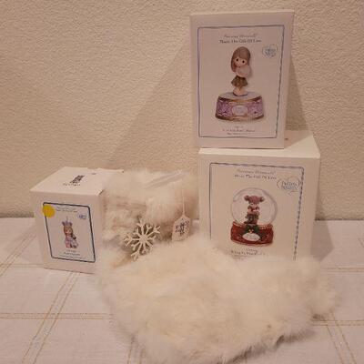 Lot 991: Rabbit Fur Stocking + Precious Moments Christmas Figures 