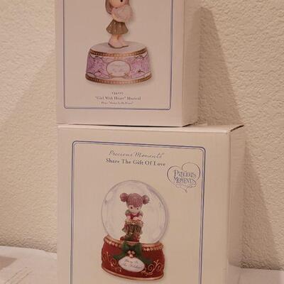 Lot 991: Rabbit Fur Stocking + Precious Moments Christmas Figures 