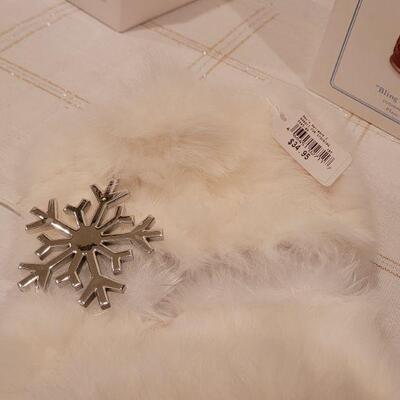 Lot 991: Rabbit Fur Stocking + Precious Moments Christmas Figures 