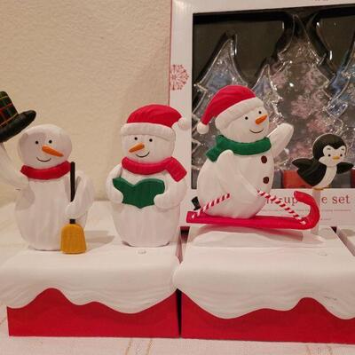 Lot 995: Set of (4) Hallmark Synchronized Christmas Snowman Dancers + LED Backlight Trees