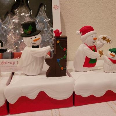 Lot 995: Set of (4) Hallmark Synchronized Christmas Snowman Dancers + LED Backlight Trees