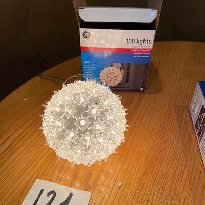 3 lighted spheres