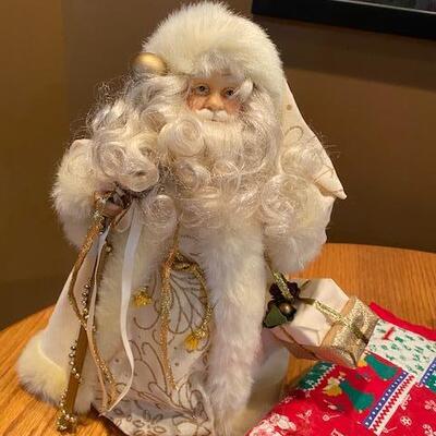 2 tree skirts and santa 