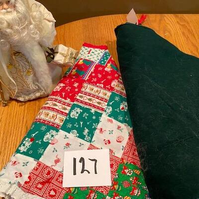 2 tree skirts and santa 
