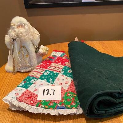 2 tree skirts and santa 