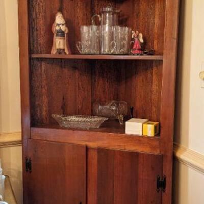 Corner cabinet with lower doors. Cyprus back? 80
