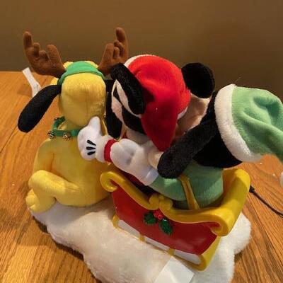 Mickey and friends on a sled