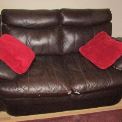 LOT 85  BROWN FAUX LEATHER LOVE SEAT