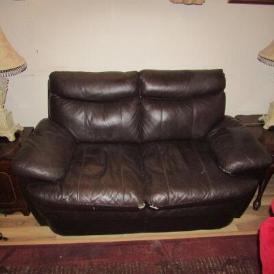 LOT 85  BROWN FAUX LEATHER LOVE SEAT