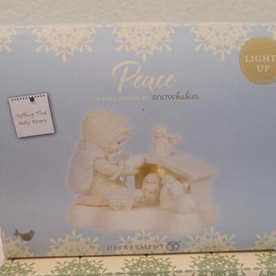 Lot 25: Assorted Dept. 56 Snowbabies Christmas Figures 