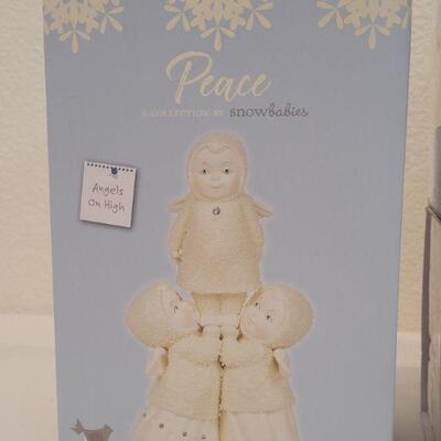 Lot 25: Assorted Dept. 56 Snowbabies Christmas Figures 