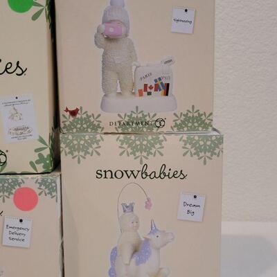 Lot 27: Assorted Dept. 56 Snowbabies Christmas Figures 