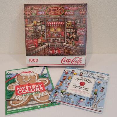 Lot 28: NEW Springbok COCA COLA 1000 pc. PUZZLE + Christmas Activity Books