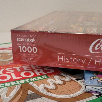 Lot 28: NEW Springbok COCA COLA 1000 pc. PUZZLE + Christmas Activity Books