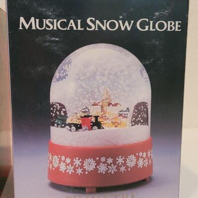 Lot 30: (2) SILVESTRI Christmas Snow Globes