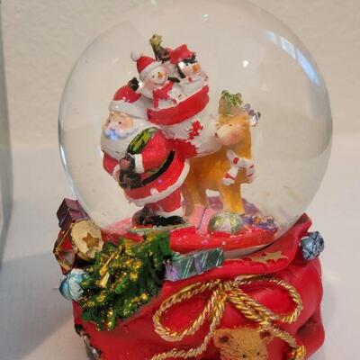 Lot 32: Pair of Vintage Christmas Snowglobes