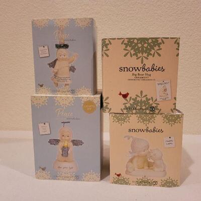 Lot 53: Assorted Dept. 56 Snowbabies Christmas Figures 