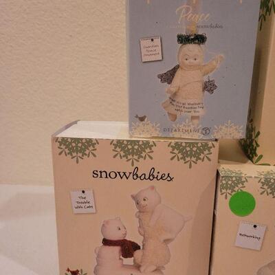 Lot 54: Assorted Dept 56. Snowbabies Christmas Figures 