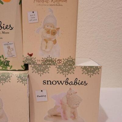 Lot 54: Assorted Dept 56. Snowbabies Christmas Figures 