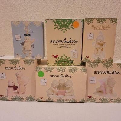 Lot 54: Assorted Dept 56. Snowbabies Christmas Figures 