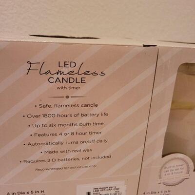 Lot 55: (2) New 4" x 5" LED Candles Hallmark Ornaments 