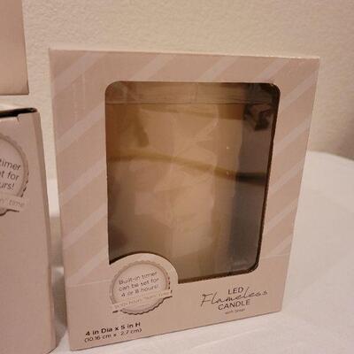 Lot 55: (2) New 4" x 5" LED Candles Hallmark Ornaments 