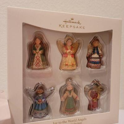 Lot 56: NEW 3" x 6" and 3" x 4" LED Candles + HALLMARK Ornaments 