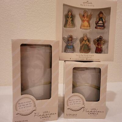 Lot 56: NEW 3" x 6" and 3" x 4" LED Candles + HALLMARK Ornaments 