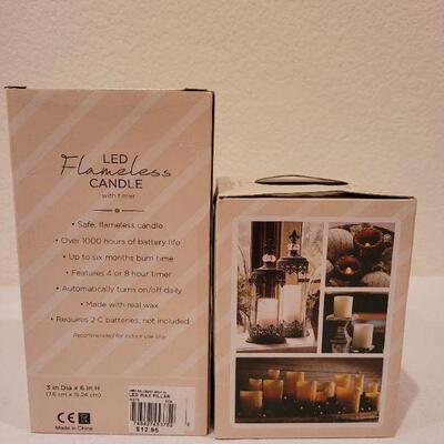 Lot 56: NEW 3" x 6" and 3" x 4" LED Candles + HALLMARK Ornaments 