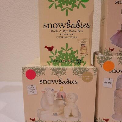 Lot 58: Assorted Dept. 56 Snowbabies Christmas Figures 