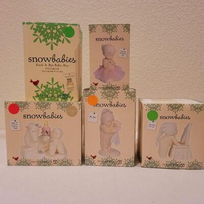 Lot 58: Assorted Dept. 56 Snowbabies Christmas Figures 