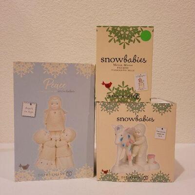 Lot 59: Assorted Dept. 56 Snowbabies Christmas Figures 