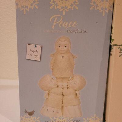Lot 59: Assorted Dept. 56 Snowbabies Christmas Figures 